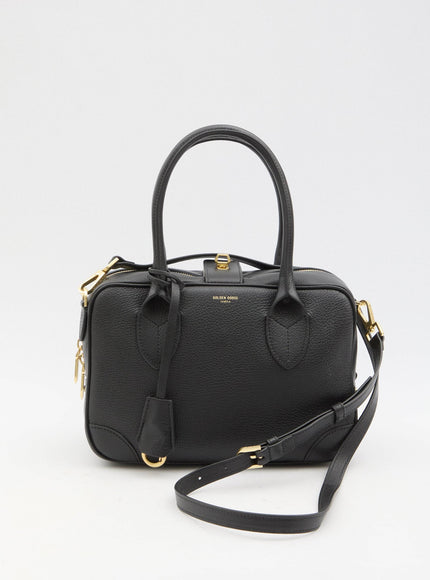 a small black handbag with a strap