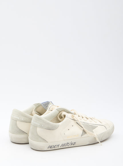 Side view of Golden Goose Super-star Sneakers with lettering