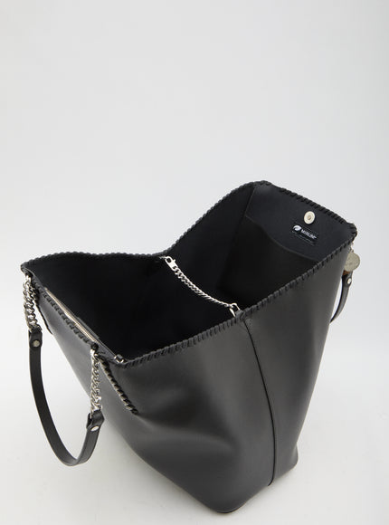 a black leather bag with a chain handle