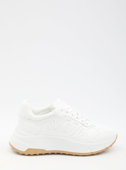 a white sneaker with a rubber sole