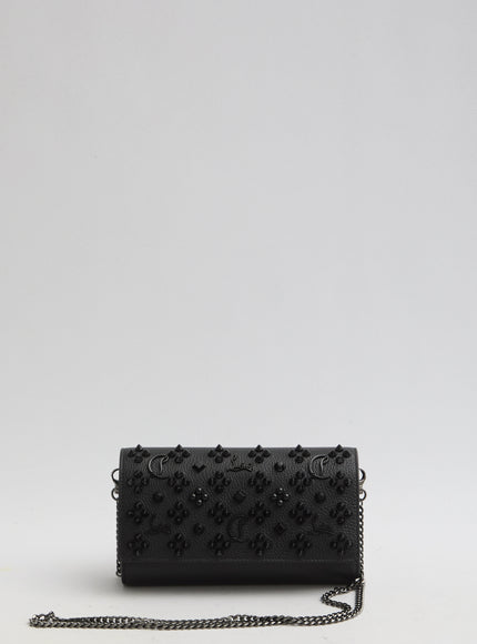 a black purse with a chain strap