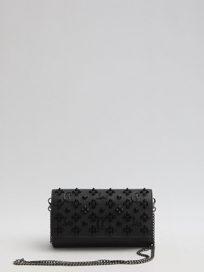 a black purse with a chain strap