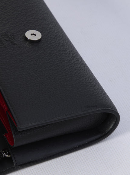 a black leather wallet with a red zipper