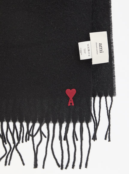 Close-up of Ami Paris Ami De Coeur scarf embroidery and tags