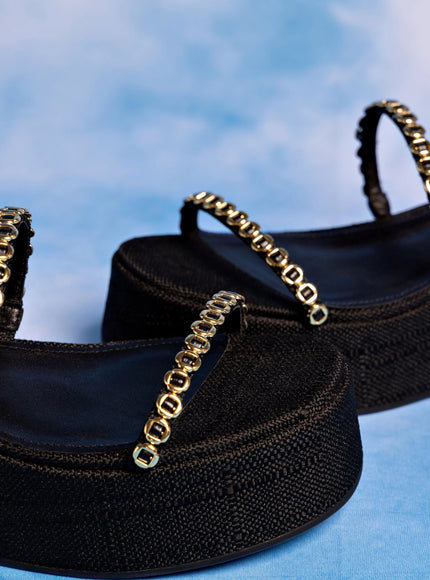 Larroude Gio Milanina Flatform Sandal In Black Raffia