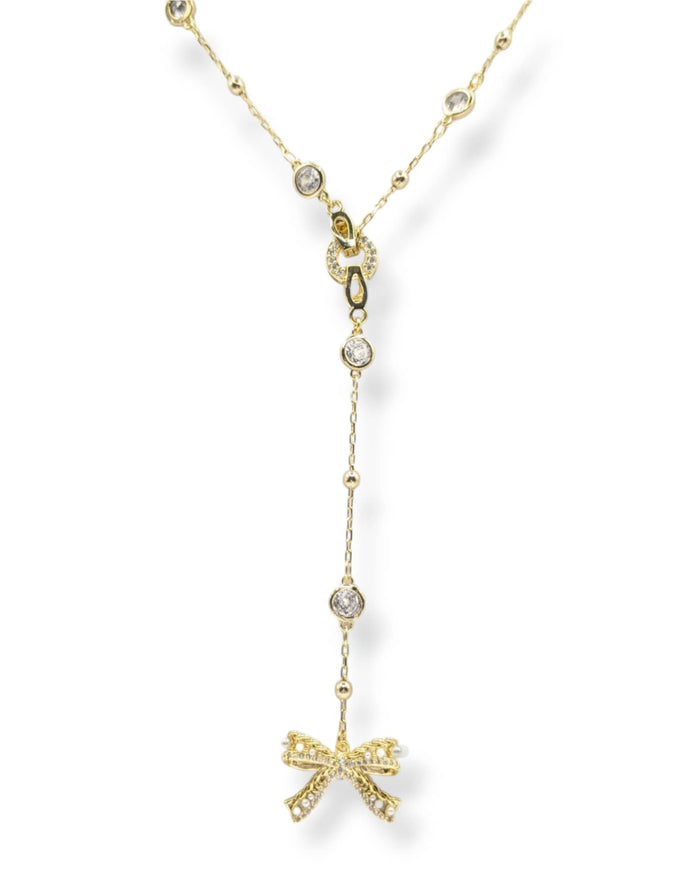 Ryan Crystal and Pearl Bow Charm Lariat Necklace