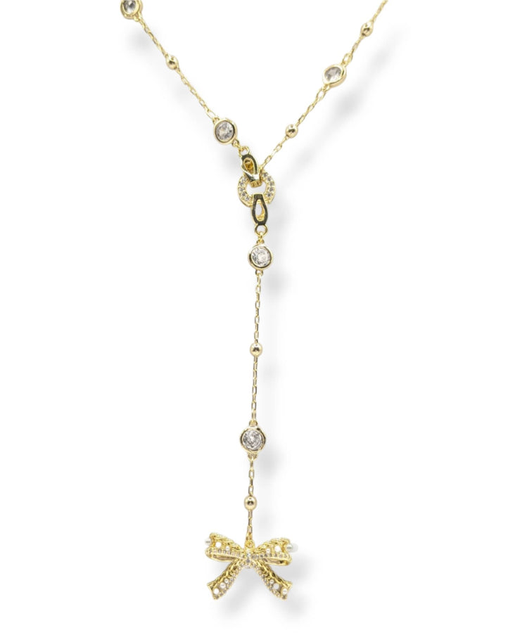 Ryan Crystal and Pearl Bow Charm Lariat Necklace