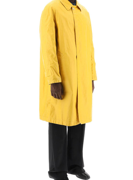 Maison Margiela trench coat in worn-out effect coated cotton