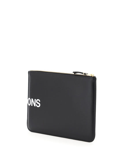 Comme Des Garcons Wallet leather pouch with logo