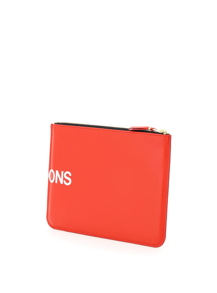 Comme Des Garcons Wallet leather pouch with logo