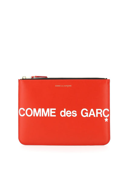 Comme Des Garcons Wallet leather pouch with logo