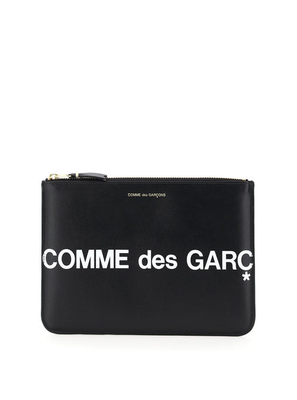 Comme Des Garcons Wallet leather pouch with logo