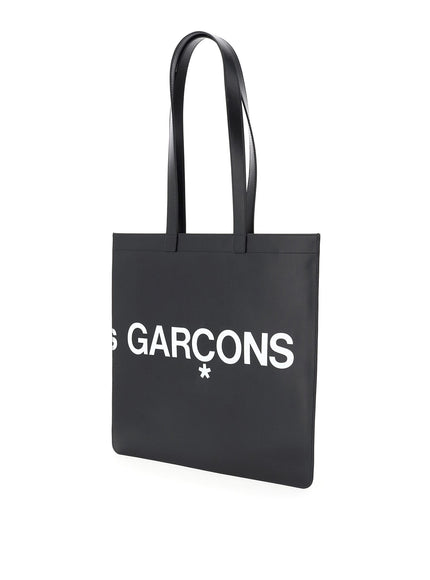 Comme Des Garcons Wallet leather tote bag with logo