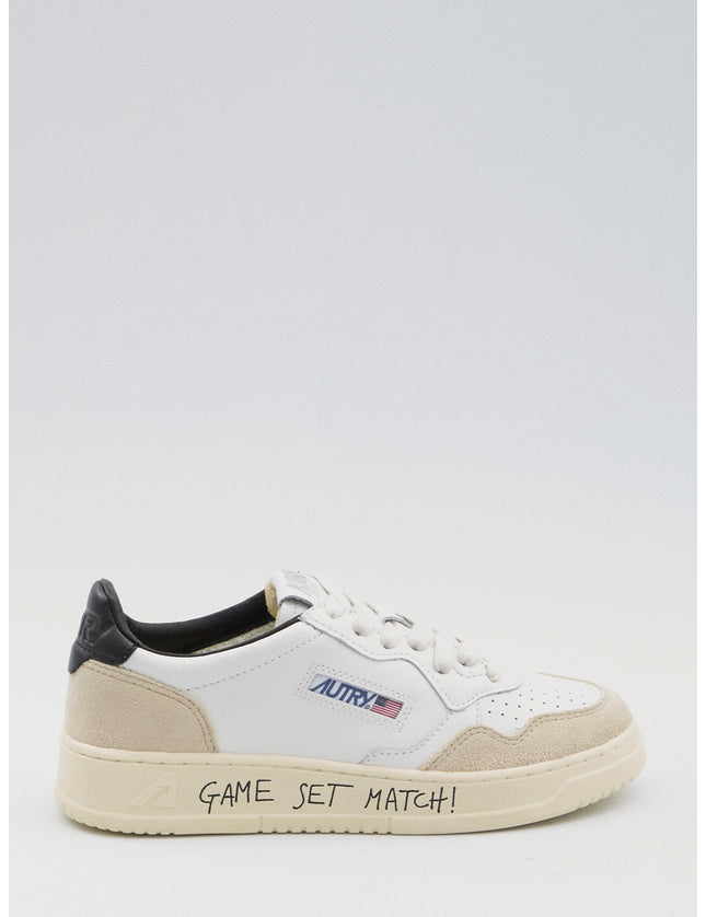 Autry Medalist Low Leather Sneakers in Ivory and Black - Ellie Belle