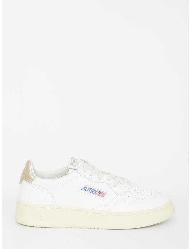 Autry Medalist White And Gold Sneakers - Ellie Belle