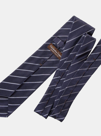 Navy satin and silver silk tie styled for a wedding