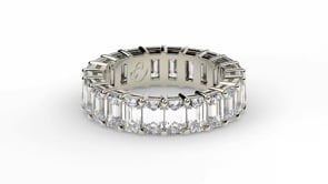 Emerald cut diamond eternity ring in white gold, side view