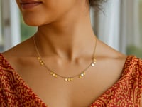 Collier en or jaune 14 carats avec pendentifs circulaires