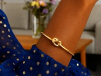 14k Yellow Gold Bangle Bracelet with Polished Knot