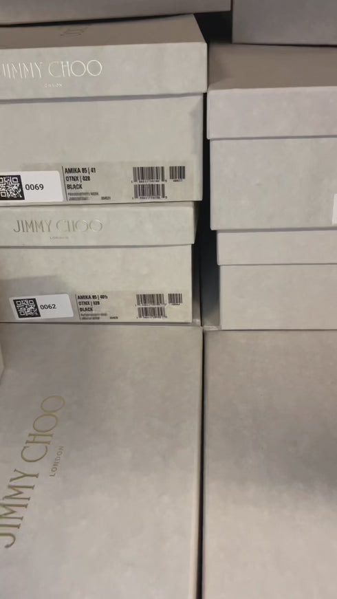 Jimmy Choo shoe boxes stacked