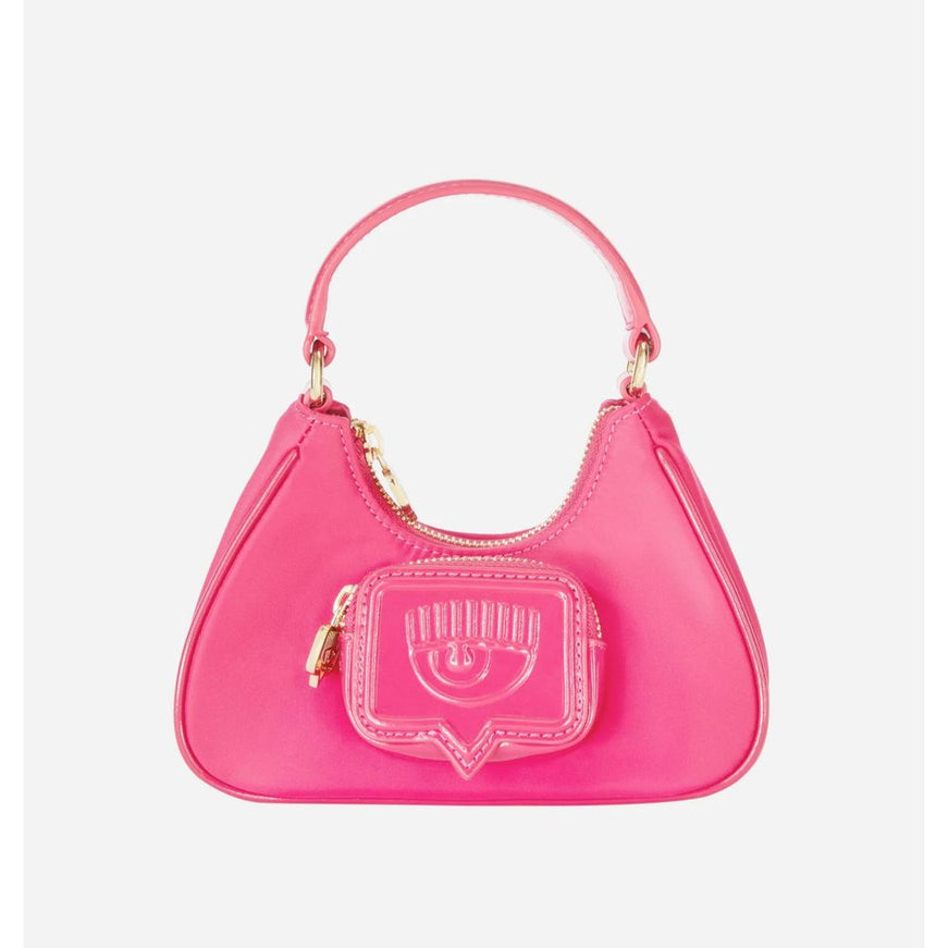 a pink handbag with a smiley face on it