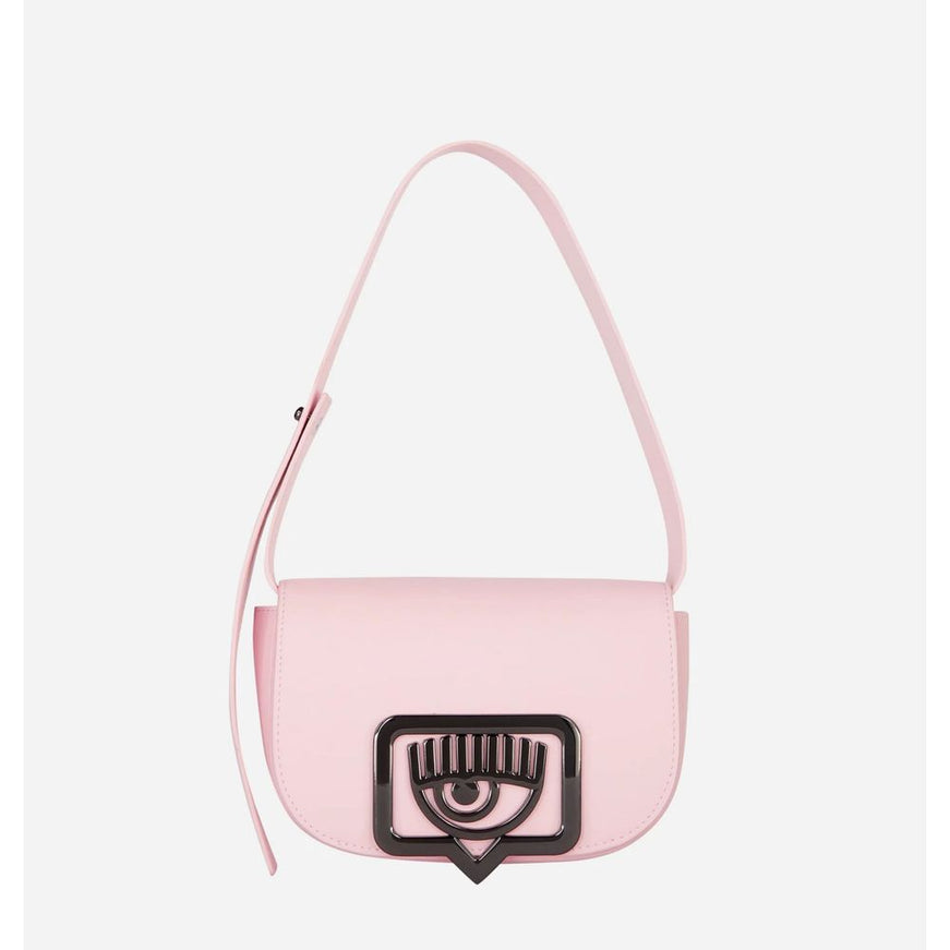 a pink handbag with an eye on the front