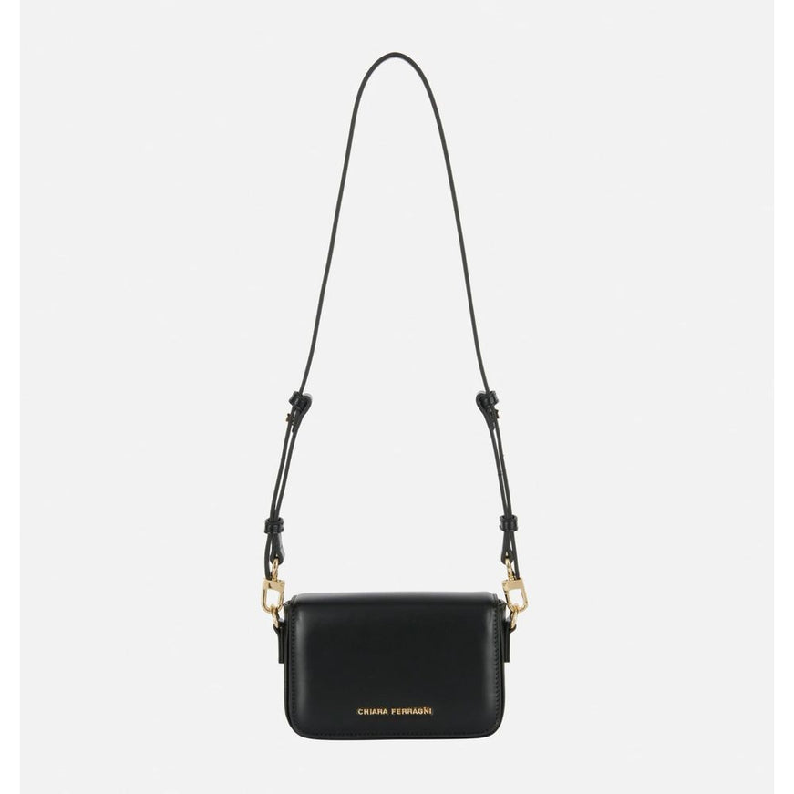 a black handbag with a chain strap