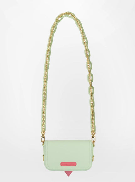 a handbag with a chain around it