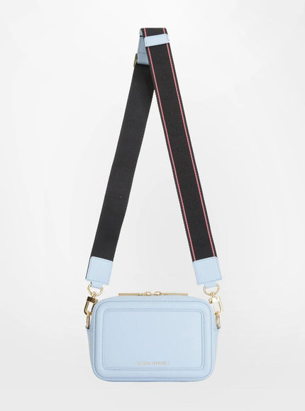 a blue cross body bag with a black strap