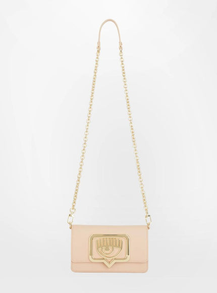 a pink and gold clutch bag with a chain strap