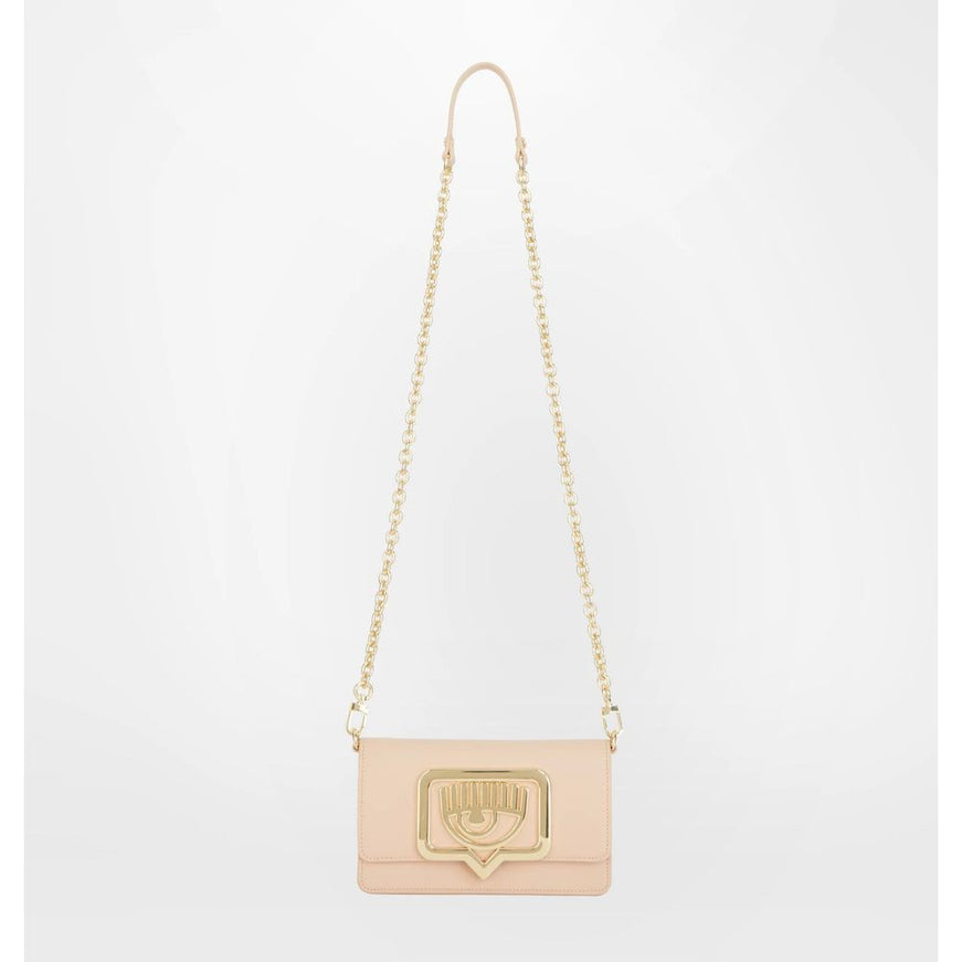 a pink and gold clutch bag with a chain strap