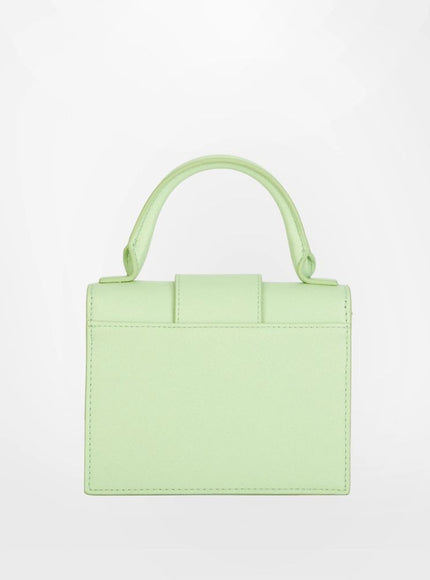 a light green handbag on a white background