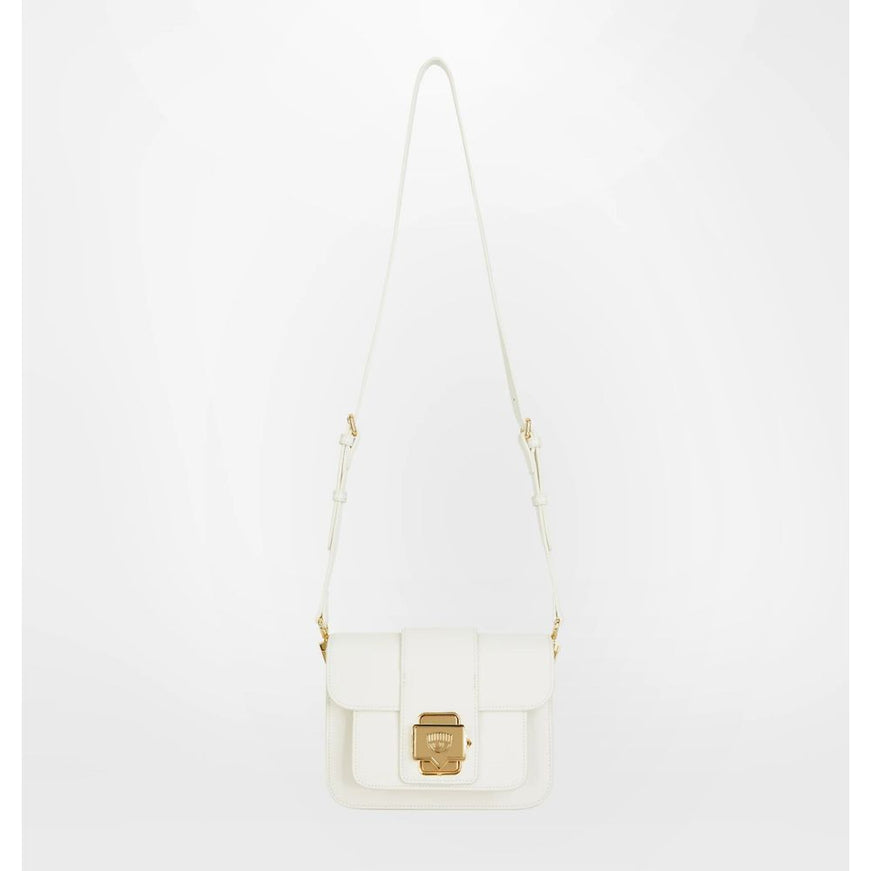 a white handbag with a gold buckle