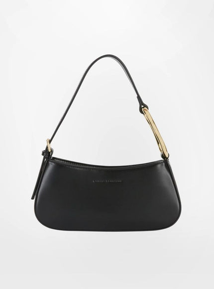 a black handbag with a gold handle