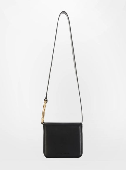 a small black bag with a long strap