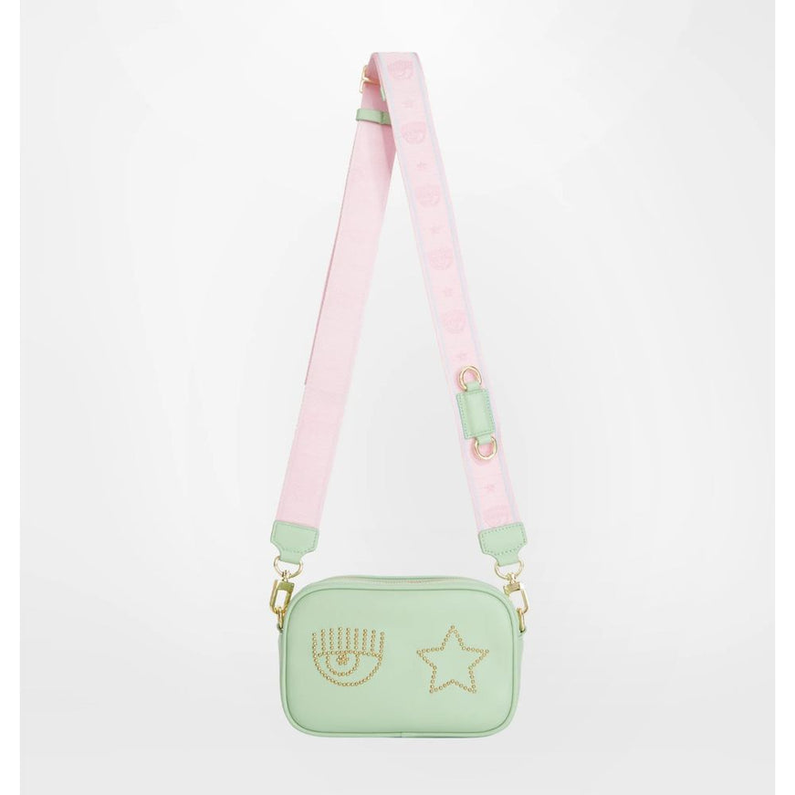 a green and pink bag with a star on it