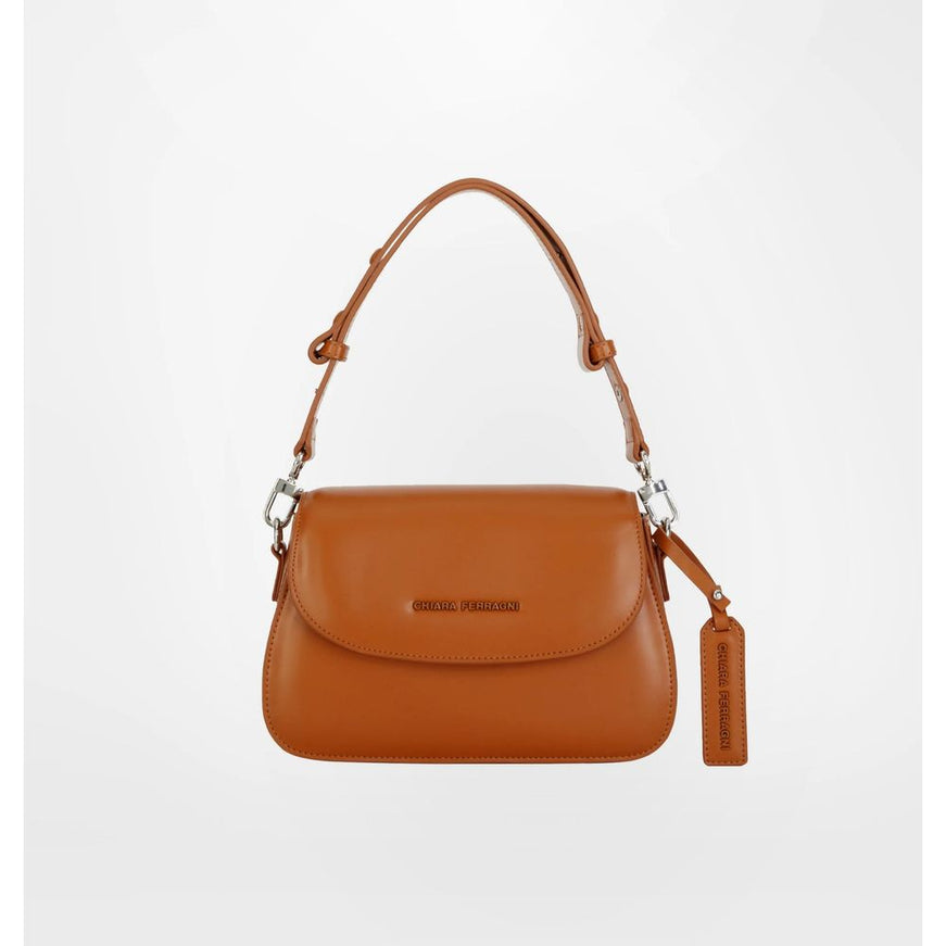 a brown handbag with a long strap