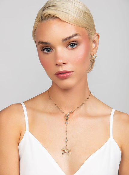 Ryan Crystal and Pearl Bow Charm Lariat Necklace