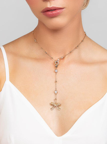 Ryan Crystal and Pearl Bow Charm Lariat Necklace
