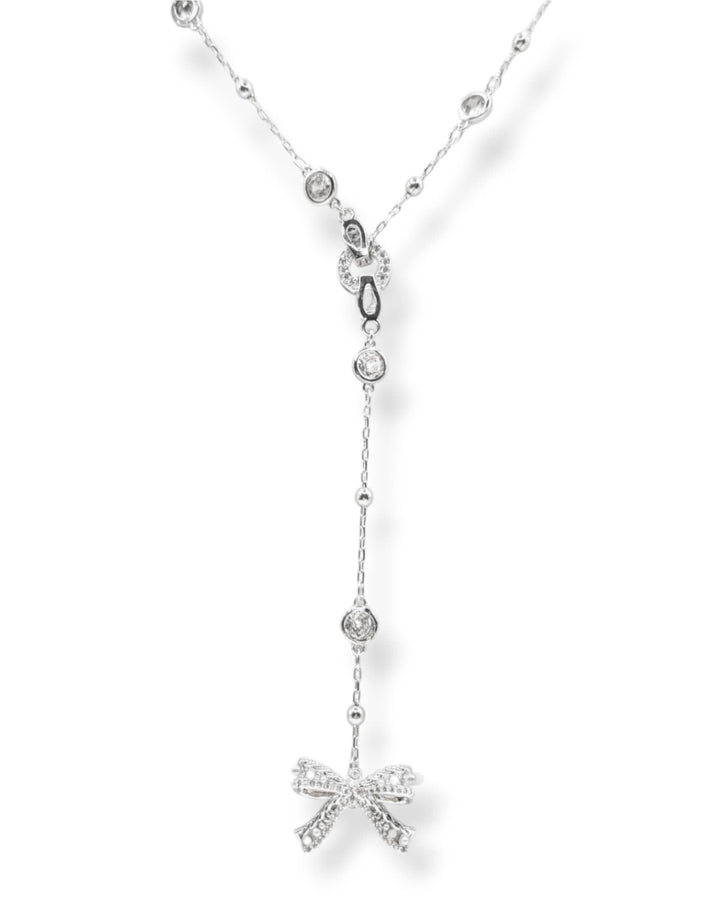 Ryan Crystal and Pearl Bow Charm Lariat Necklace