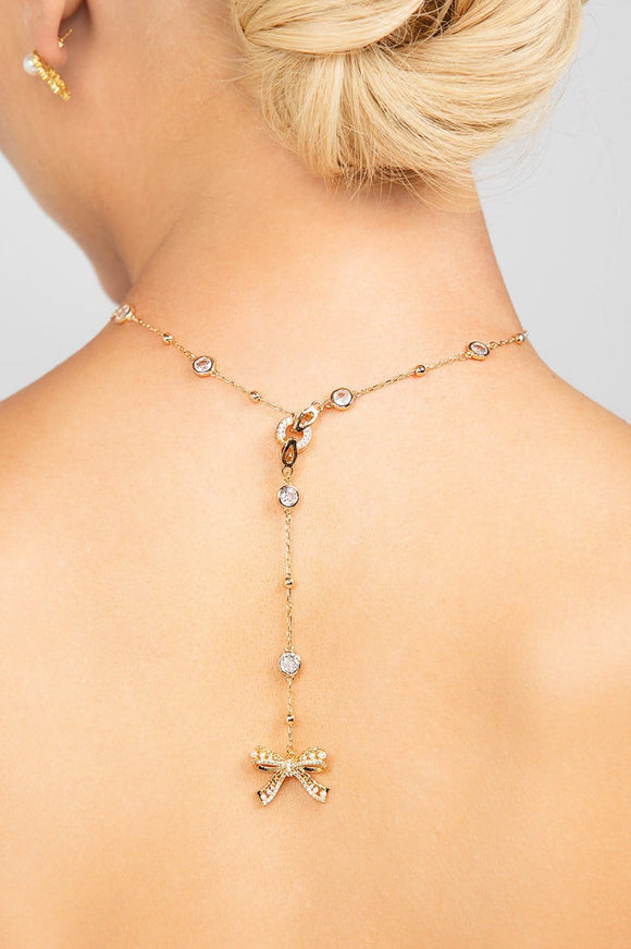 Ryan Crystal and Pearl Bow Charm Lariat Necklace