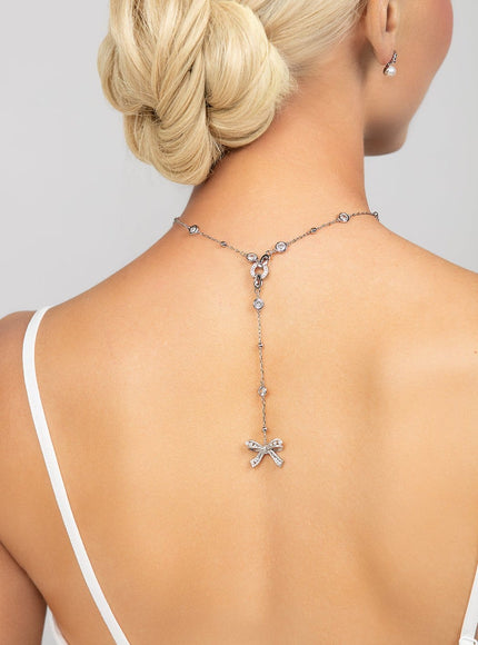 Ryan Crystal and Pearl Bow Charm Lariat Necklace