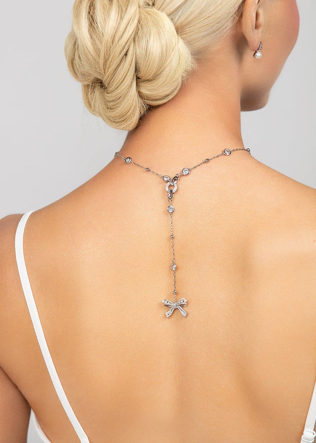 Ryan Crystal and Pearl Bow Charm Lariat Necklace