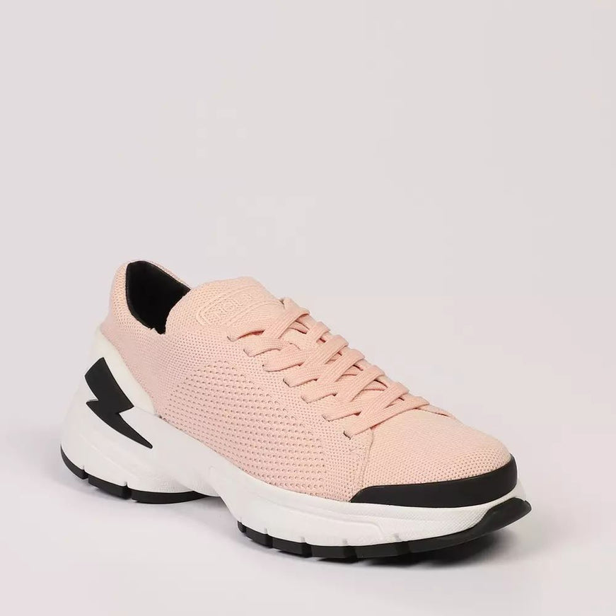 a pink sneaker with a black and white sole