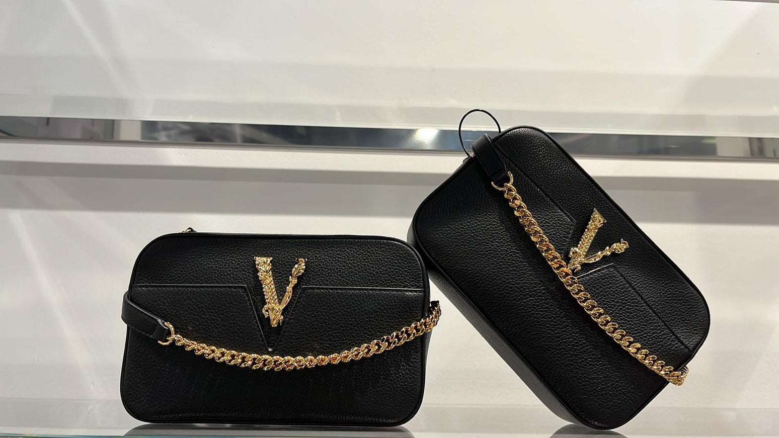 Versace black calfskin Virtus camera bags with gold chain