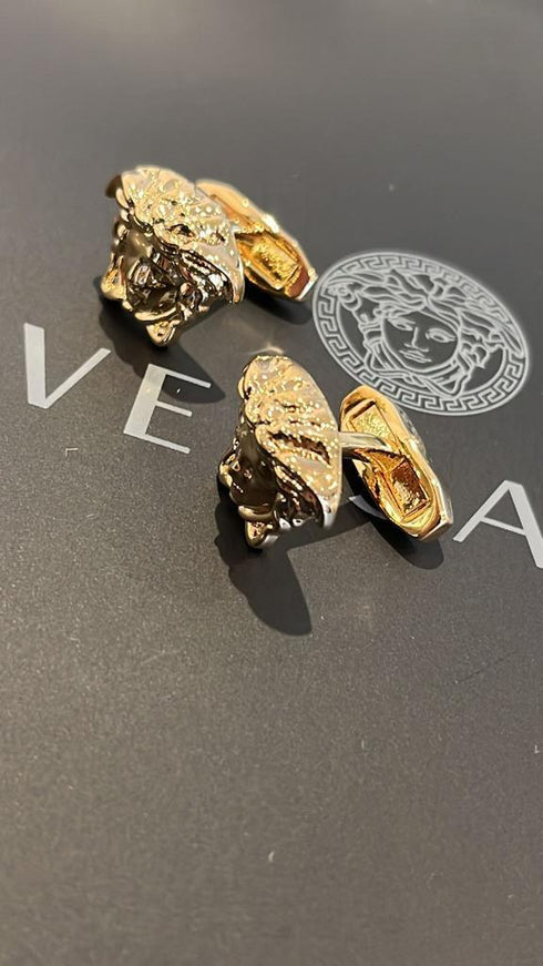 Versace Medusa men's cufflinks on display